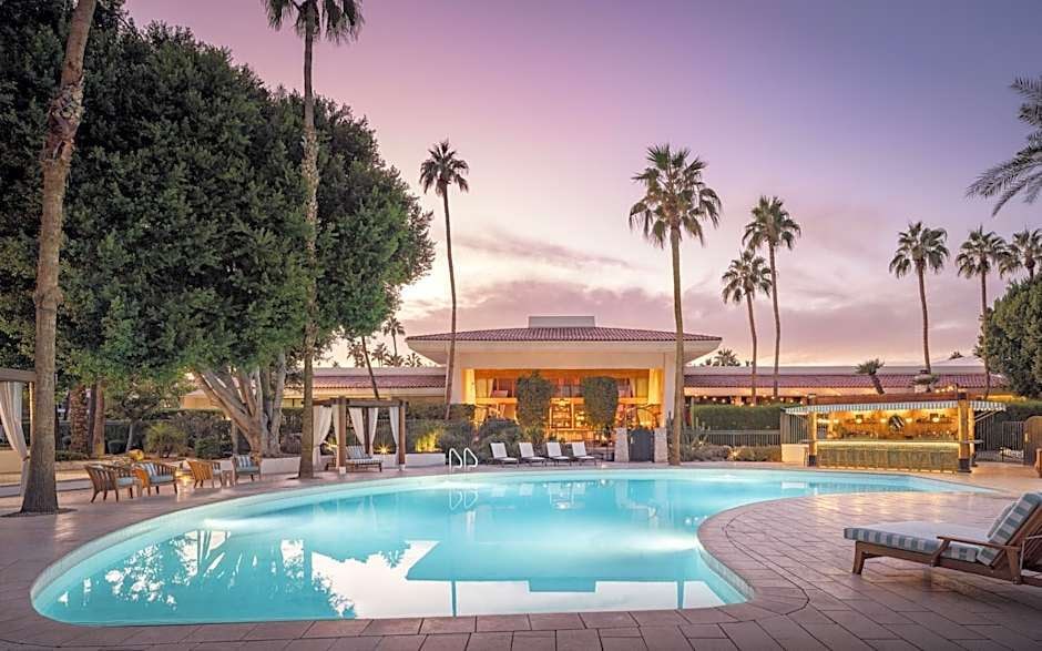 The Scott Resort pool at sunset